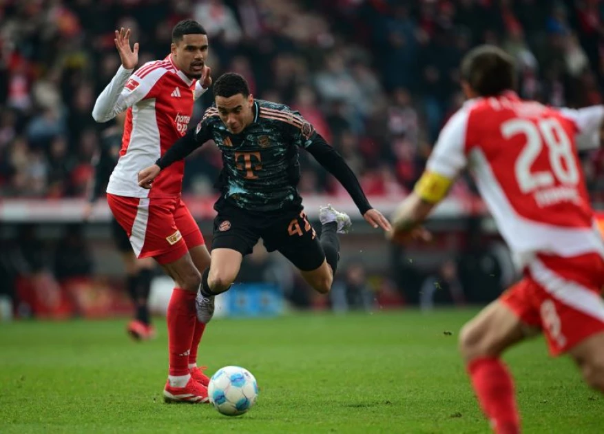 “Bayern’s Draw Keeps Title Hopes Alive as Dortmund Fall to Leipzig”
